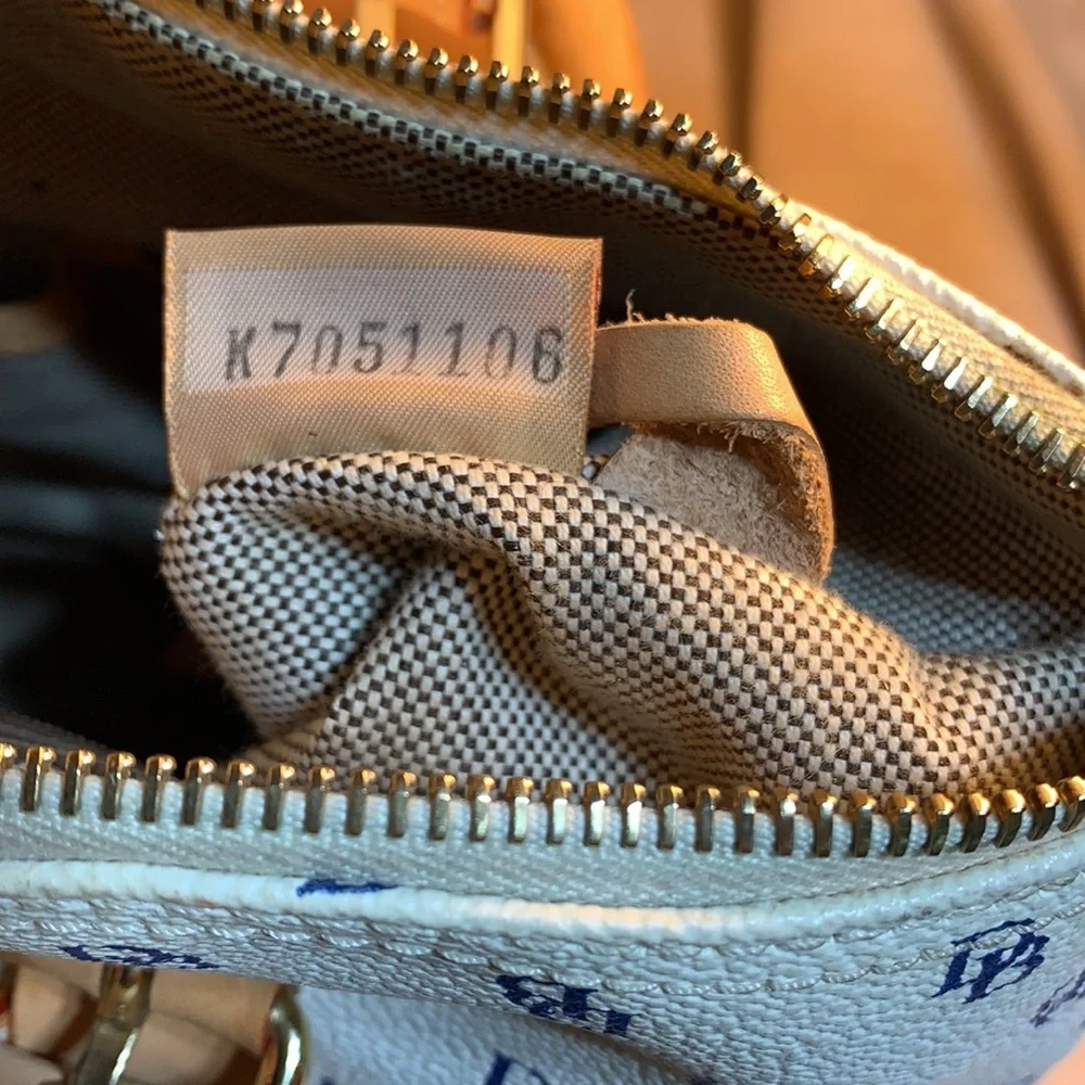 Dooney & Bourke leather satchel w/logo pattern